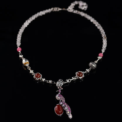 Peacock & Garnet Amulet Necklace