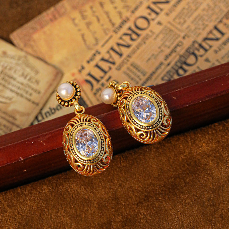 Oval Hollow Floral Stud Earrings